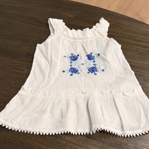 White Sleeveless Top with Blue Embroidery